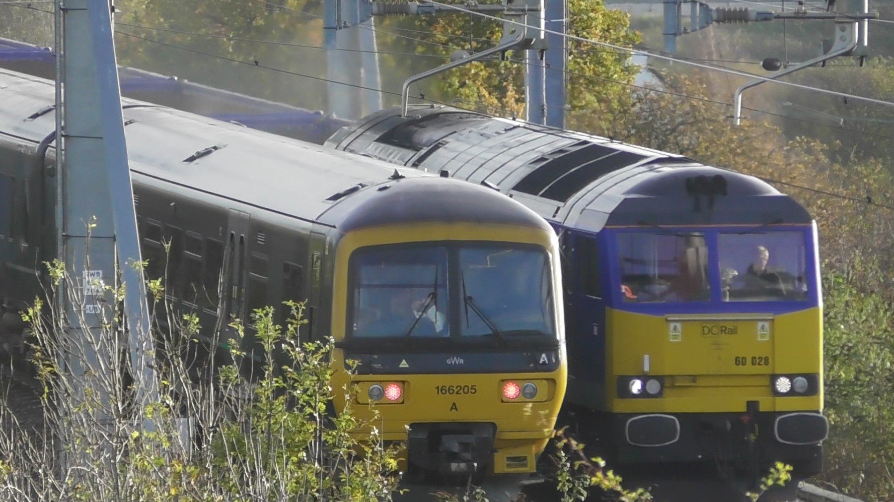 Photo of 166205 and 60028 at stoke Gifford bypass — trainlogger