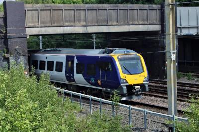 331022 at Wigan Springs Branch (passing). &copy; stevexos