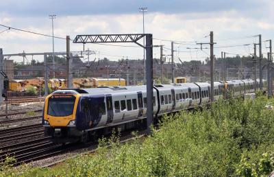 331024 at Wigan Springs Branch (passing). &copy; stevexos
